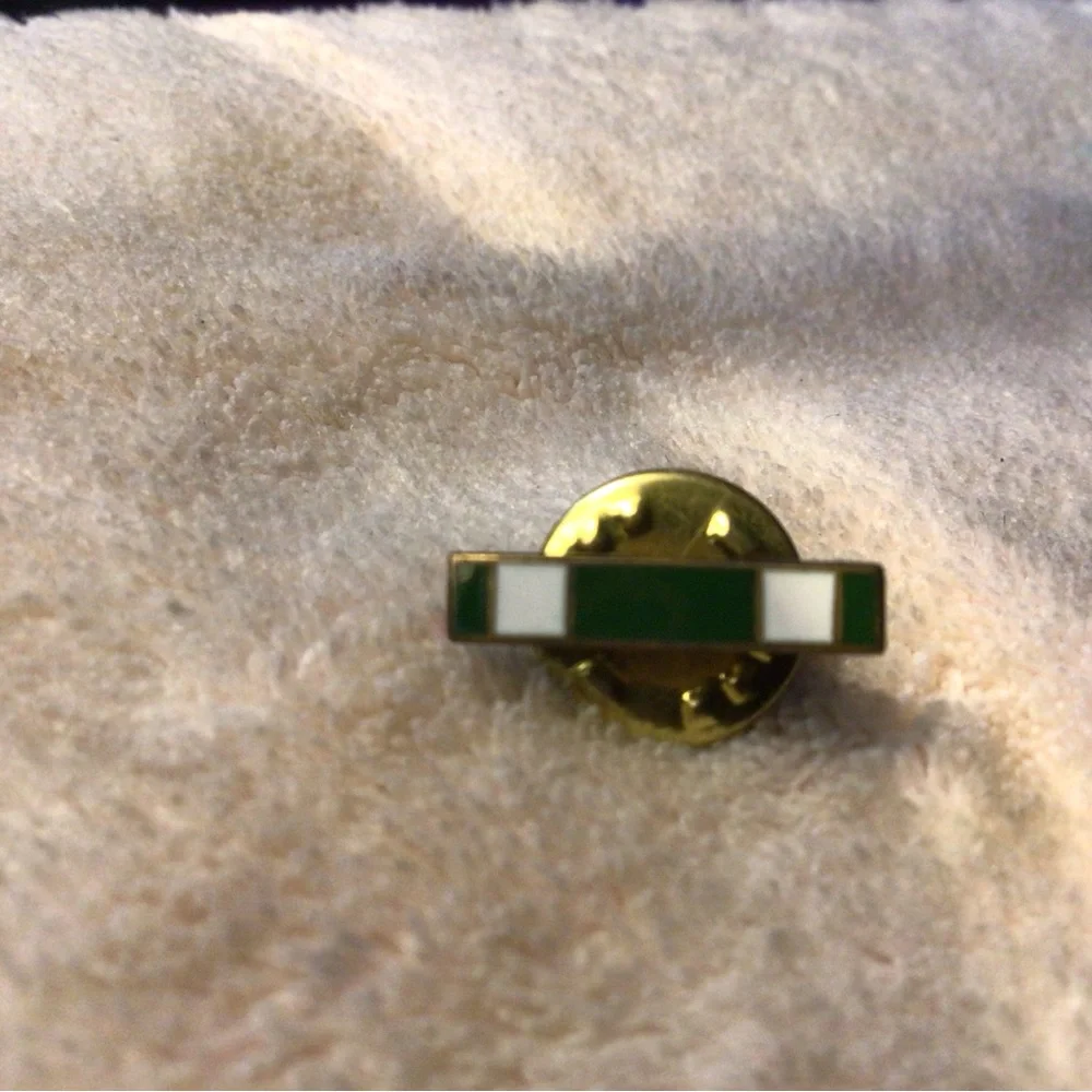 Green and White Enamel Lapel Pin with Gold Backing